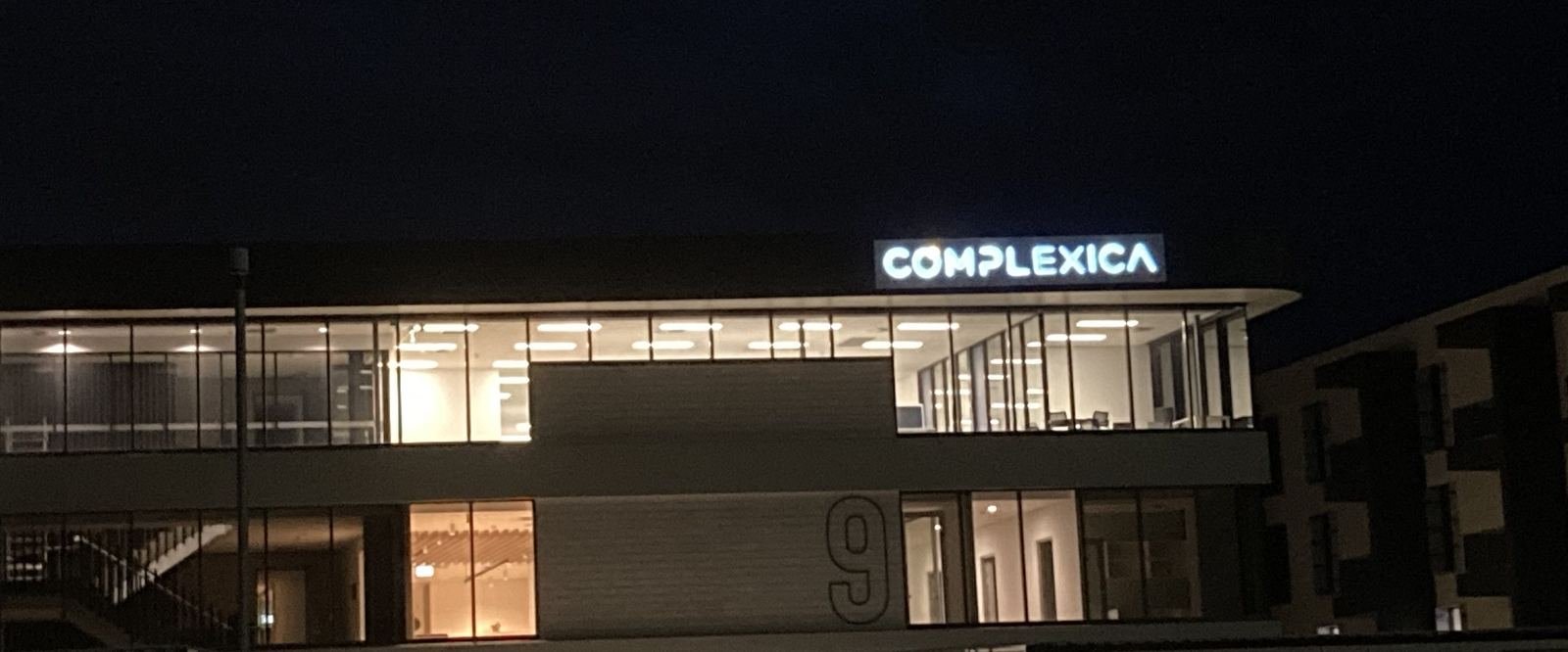 Complexica headquarters at night