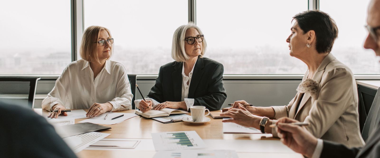 Executives meeting around a boardroom table