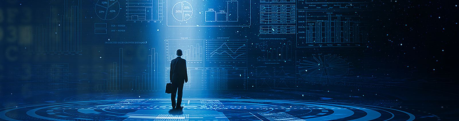 Person standing before a wall of data visualisations