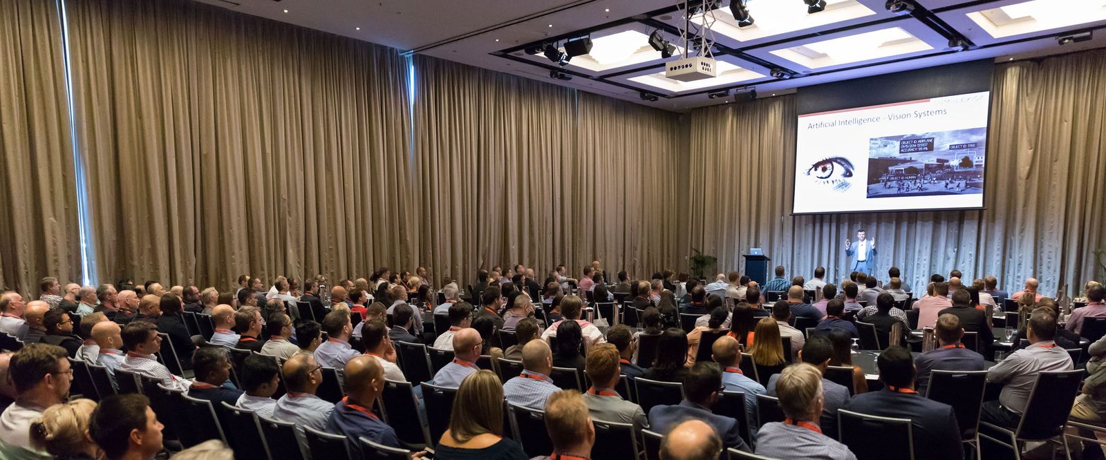 Conference audience at a Complexica keynote